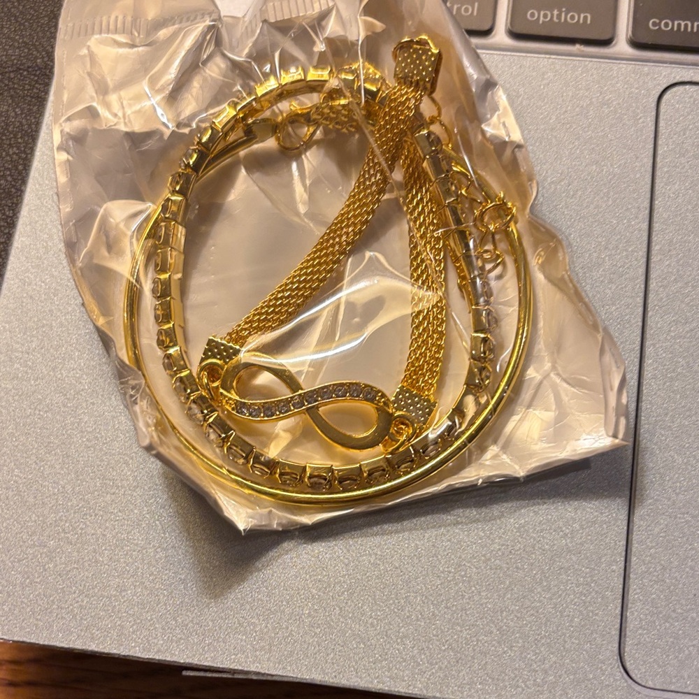 Elegant Gold Infinity Necklace and Bracelet Set